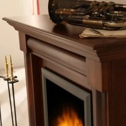 Montreux Elektrokamin Lomba - Nußbaumfarbig antik mit Wurzelfurnier -WOHNZIMMERMÖBEL Verkäufe 1000017563 220614 052 DETAILS P000000001000017563